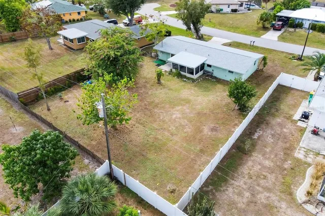a view of a yard with an outdoor space