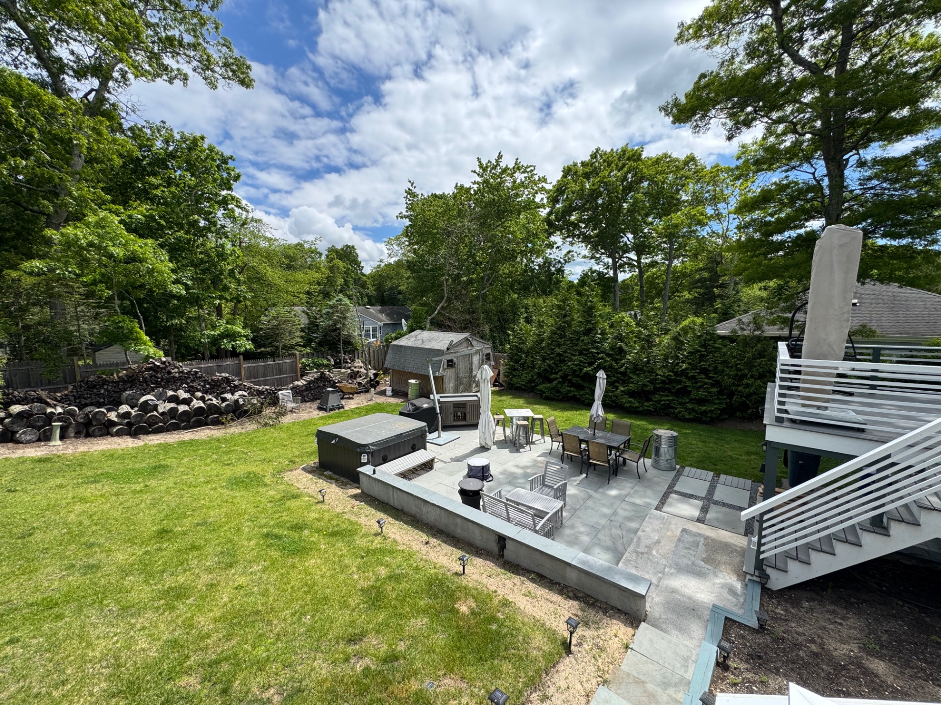 16 Fern Road Southampton, NY 11968 - Photo 8 of 9 a view of a backyard with sitting area