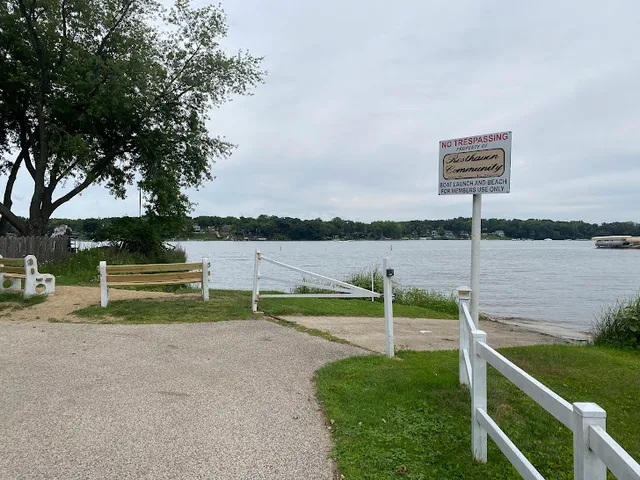 a view of a park with large trees