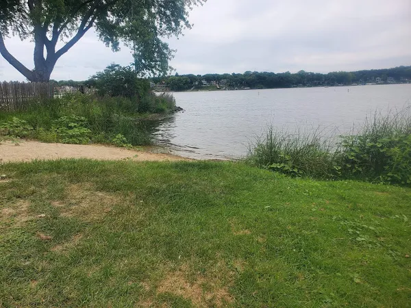 a view of a lake from a yard