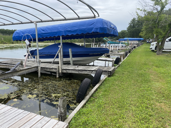39490 Summerside Drive Antioch, IL 60002 - Photo 7 of 8 a view of a backyard with a patio and a garden