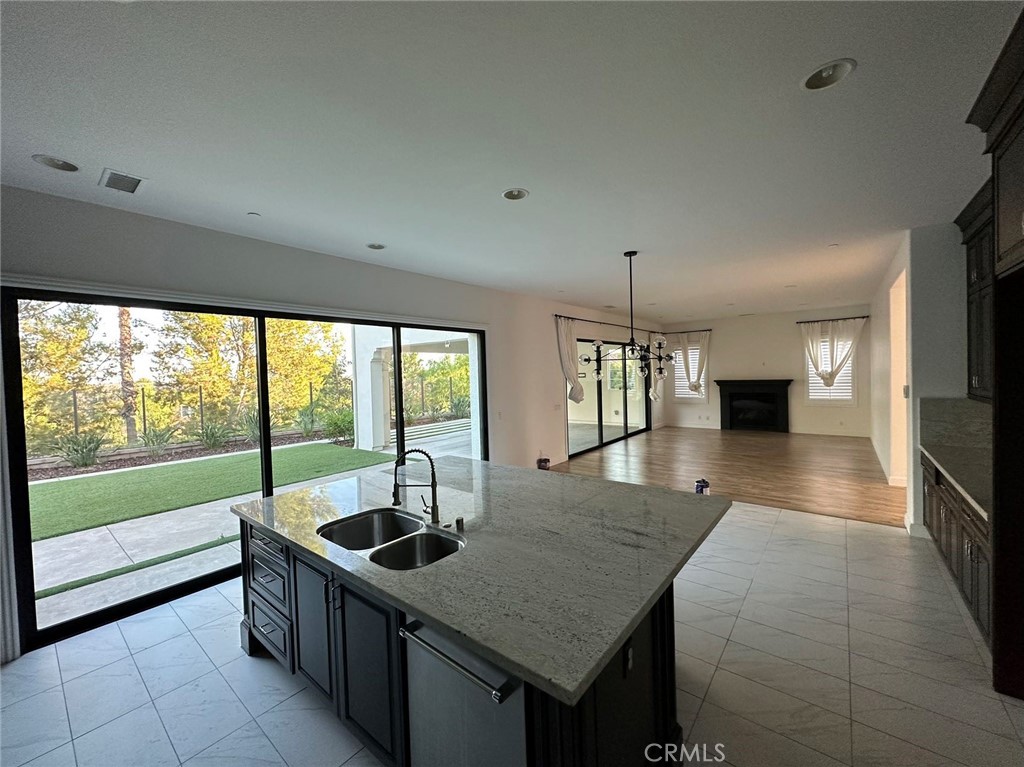 20 Hyacinth Lake Forest, CA 92630 - Photo 11 of 25 a kitchen that has a sink and a stove