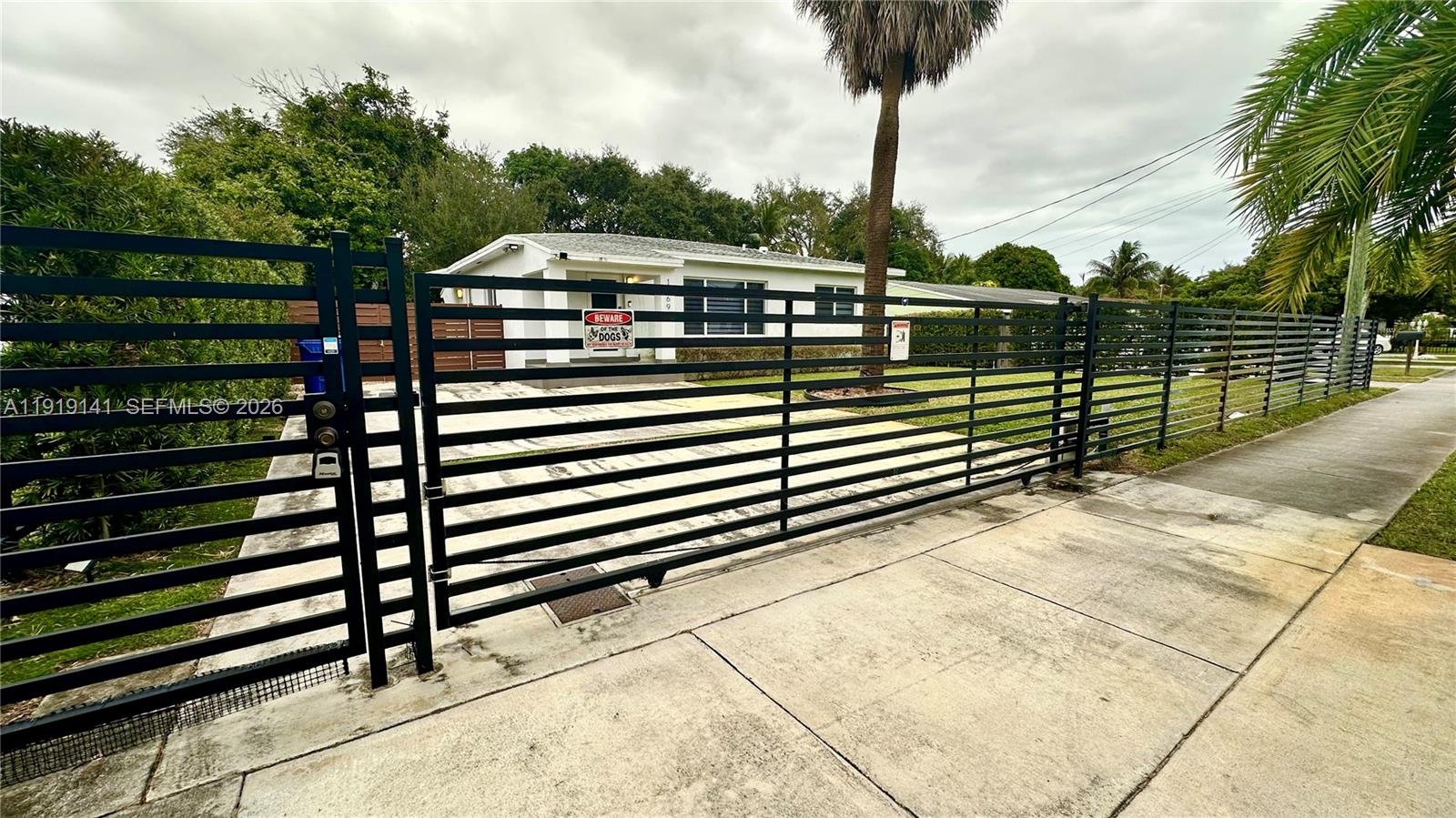 1269 Northeast 145th Street Miami, FL 33161 - Photo 8 of 25 a view of a terrace with sitting area