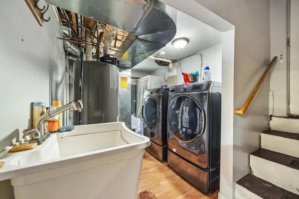 a utility room with dryer and washer