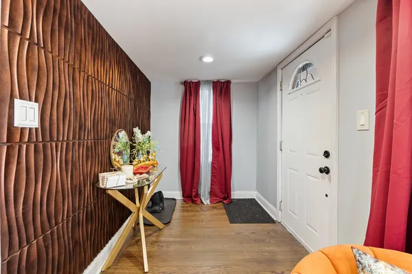 a view of a entryway with furniture and stairs