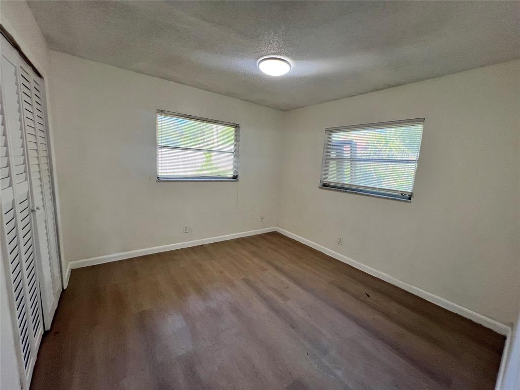 3321 Grove Road Boynton Beach, FL 33435 - Photo 6 of 9 wooden floor in an empty room