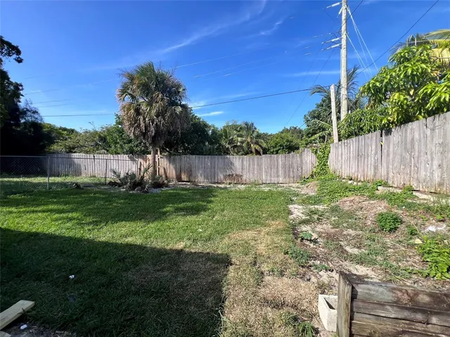 a view of garden with patio