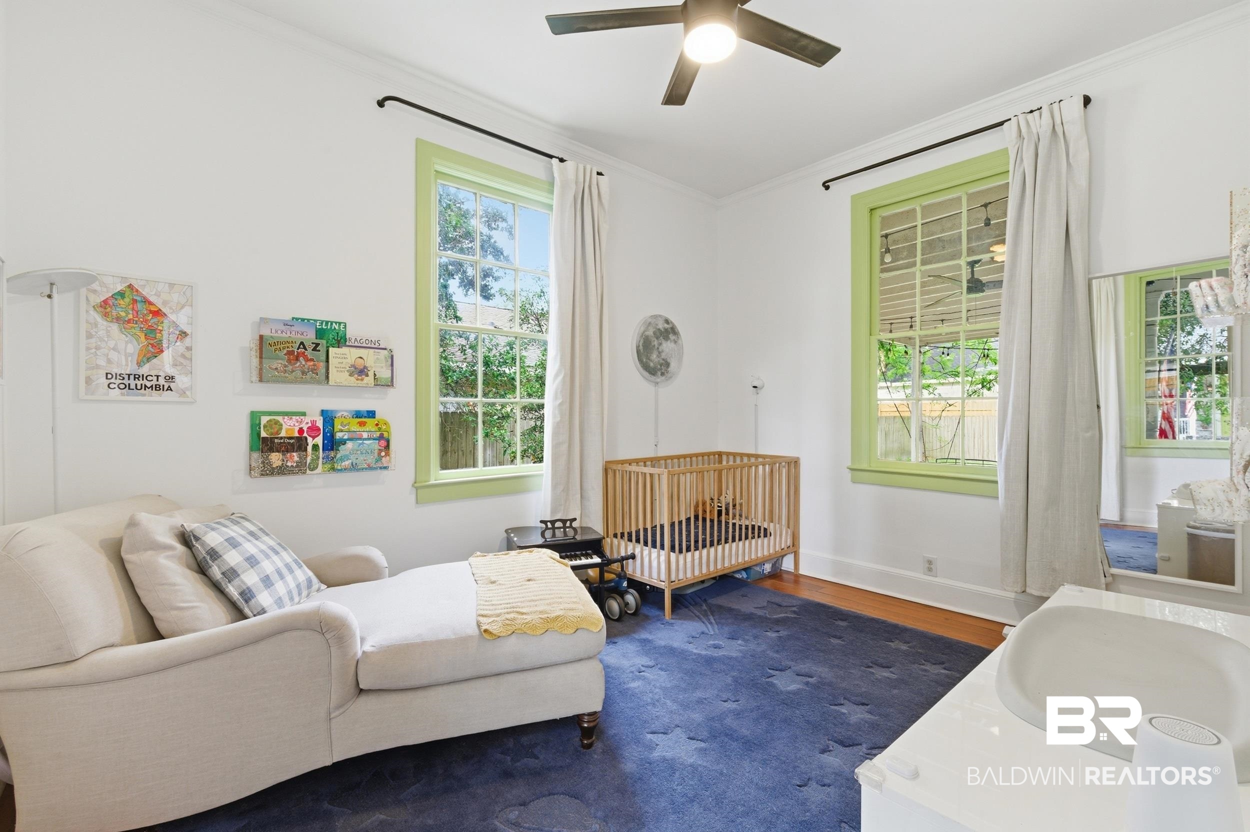 350 Charles Street Mobile, AL 36604 - Photo 24 of 52 Bright interior space featuring two large windows with light green trim and white crown molding
