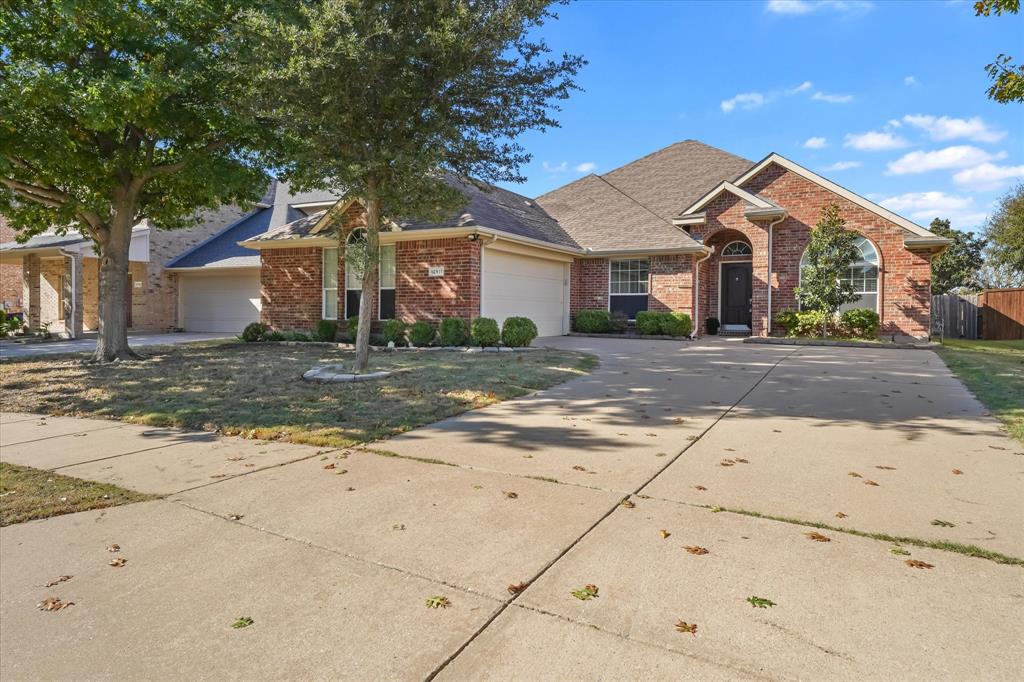 12811 Greenhaven Drive Frisco, TX 75035 - Photo 1 of 28 a view of a house with a yard