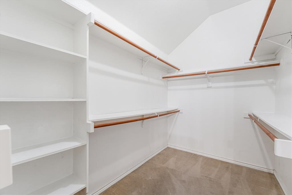 12811 Greenhaven Drive Frisco, TX 75035 - Photo 18 of 28 a view of an empty walk in closet