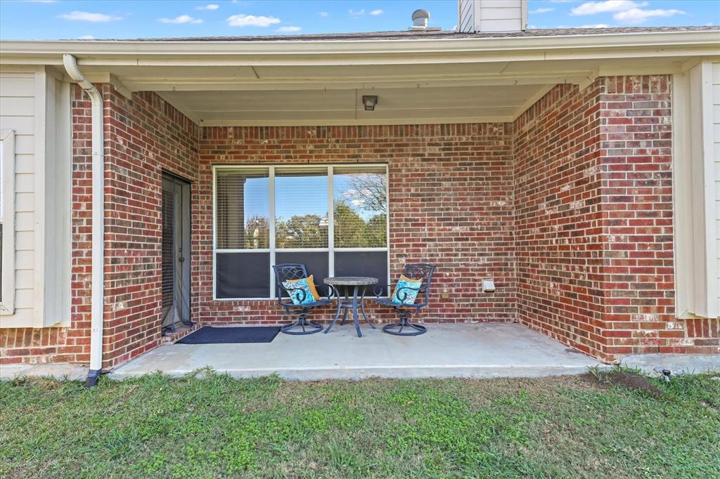12811 Greenhaven Drive Frisco, TX 75035 - Photo 26 of 28 a view of sitting area with chairs in front of door