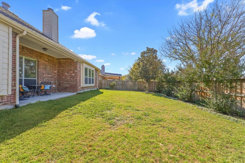 12811 Greenhaven Drive Frisco, TX 75035 - Photo 28 of 28 a view of backyard of the house