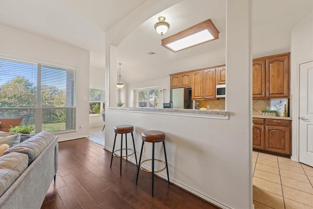 12811 Greenhaven Drive Frisco, TX 75035 - Photo 9 of 28 a living room with furniture and a window