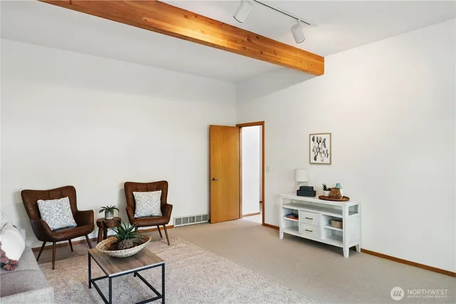 a bathroom with a sink a toilet a tub and shower