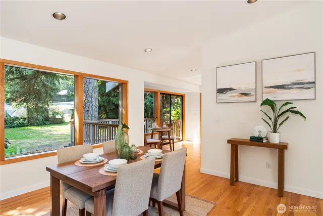 a view of a dining room with furniture window and outside view