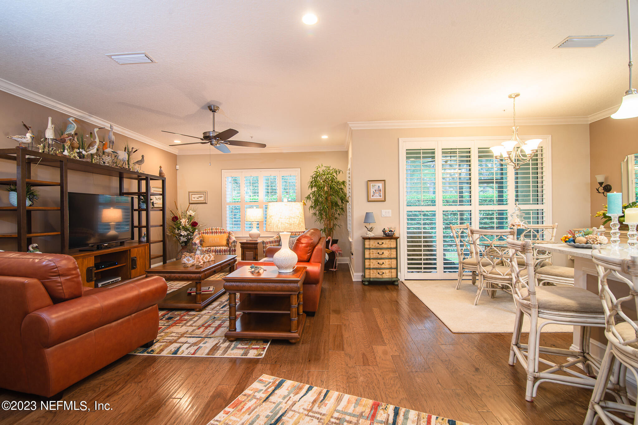 76 Oyster Bay Way Ponte Vedra, FL 32081 - Photo 12 of 28 a living room with furniture and a flat screen tv