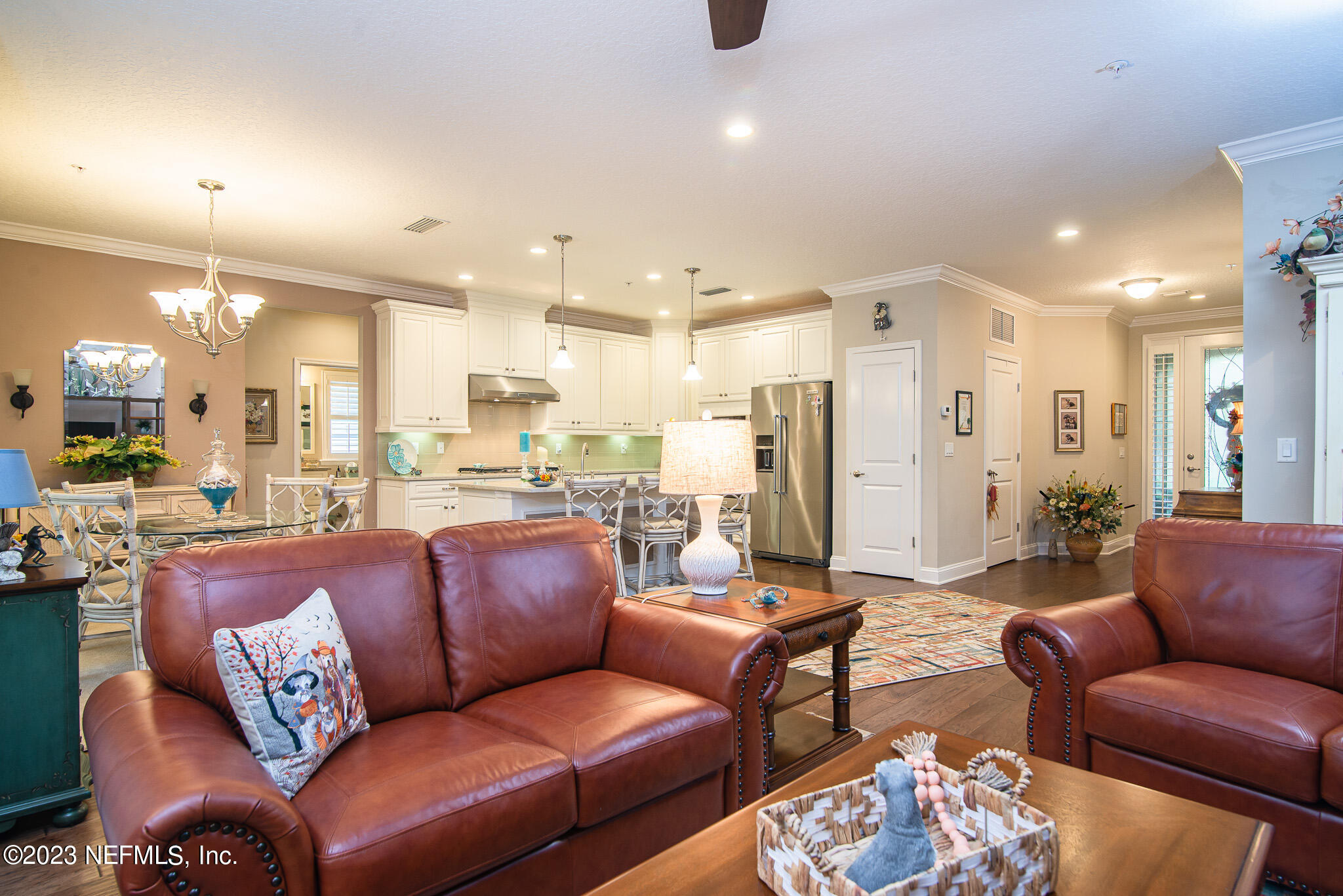 76 Oyster Bay Way Ponte Vedra, FL 32081 - Photo 15 of 28 a view of a living room kitchen and a wooden floor