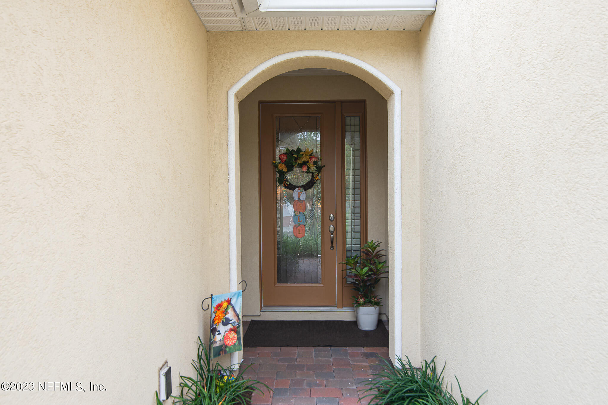 76 Oyster Bay Way Ponte Vedra, FL 32081 - Photo 3 of 28 a front view of a house with large windows