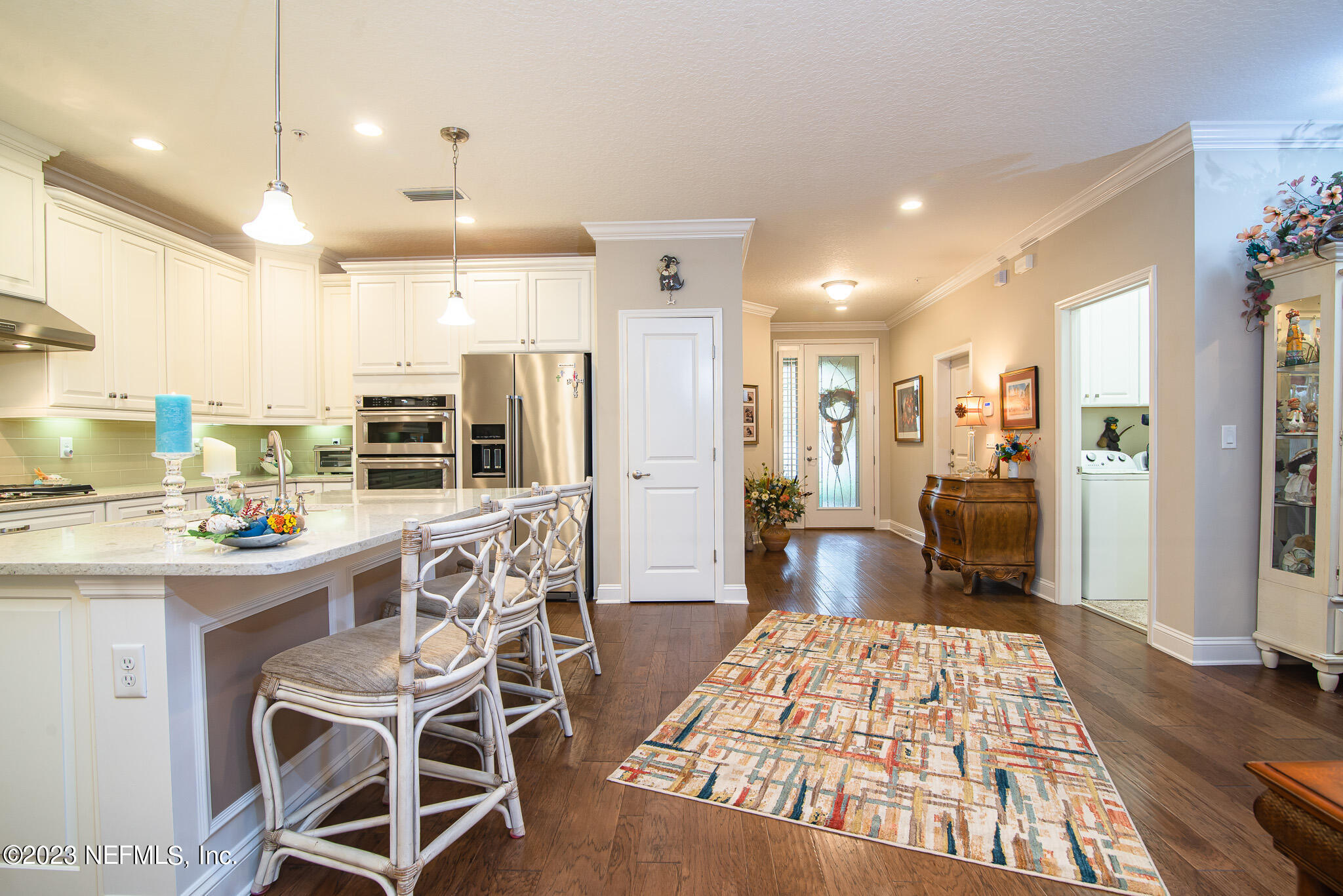 76 Oyster Bay Way Ponte Vedra, FL 32081 - Photo 5 of 28 a kitchen with stainless steel appliances granite countertop a refrigerator and a sink