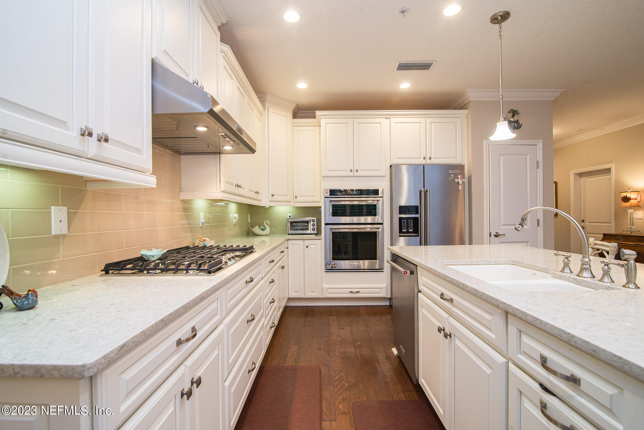 76 Oyster Bay Way Ponte Vedra, FL 32081 - Photo 7 of 28 a large kitchen with a stove and cabinets