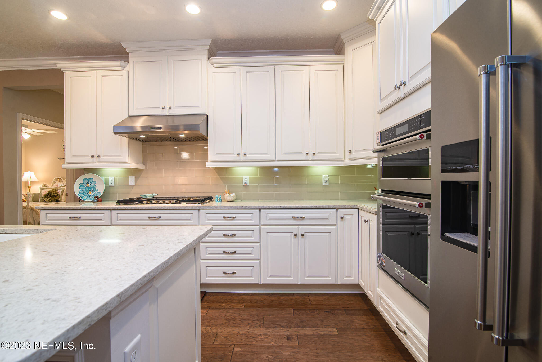 76 Oyster Bay Way Ponte Vedra, FL 32081 - Photo 8 of 28 a kitchen with granite countertop a sink stainless steel appliances and cabinets