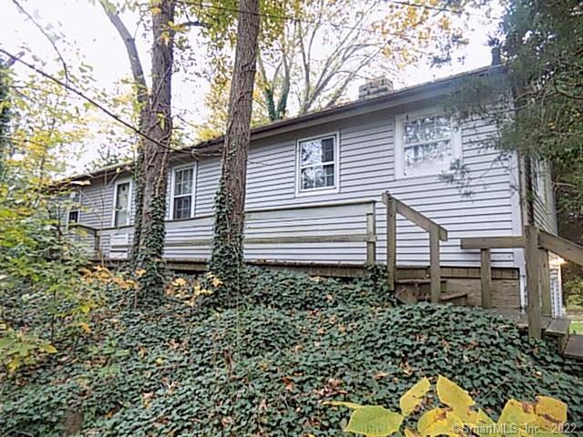 53 Thimble Island Road Branford, CT 06405 - Photo 1 of 1 a house view with a backyard space