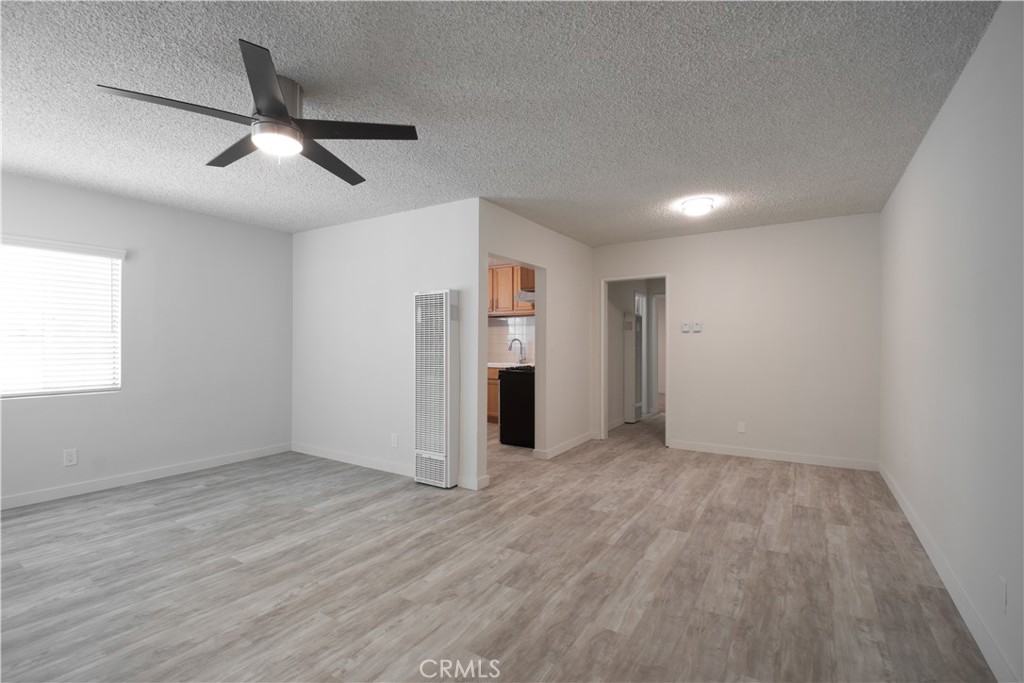 906 East Imperial Avenue El Segundo, CA 90245 - Photo 2 of 21 an empty room with closet and windows
