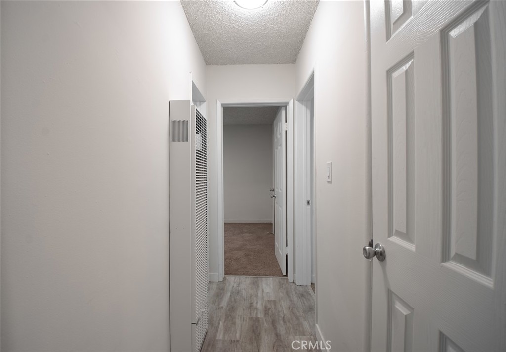 906 East Imperial Avenue El Segundo, CA 90245 - Photo 6 of 21 a view of a hallway with wooden floor