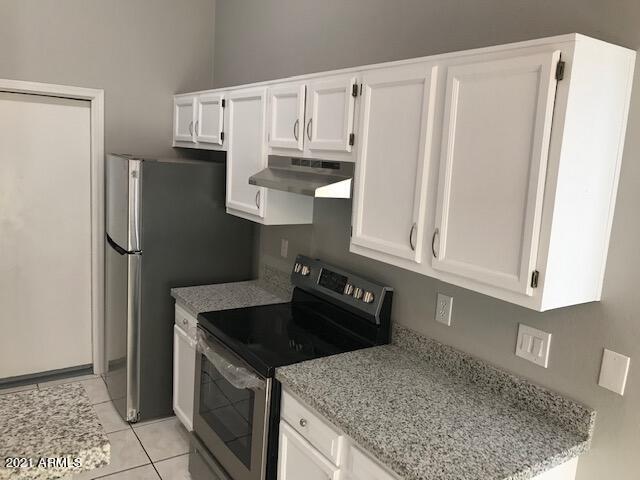 1457 East Carter Road Phoenix, AZ 85042 - Photo 4 of 11 IMG_7757