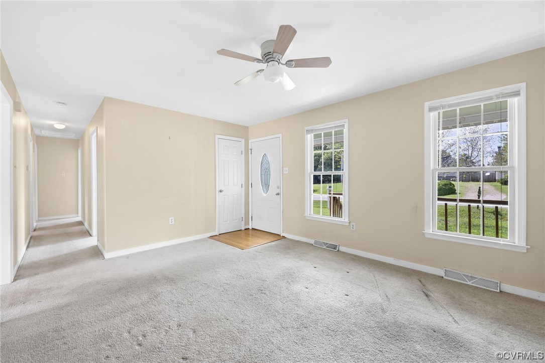 4841 Wilconna Road Chesterfield, VA 23832 - Photo 16 of 34 a view of a livingroom with a ceiling fan and window