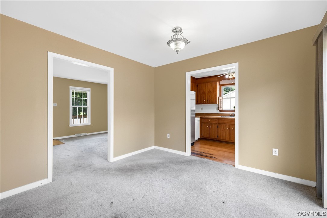 4841 Wilconna Road Chesterfield, VA 23832 - Photo 18 of 34 a view of a hallway with a livingroom and a kitchen