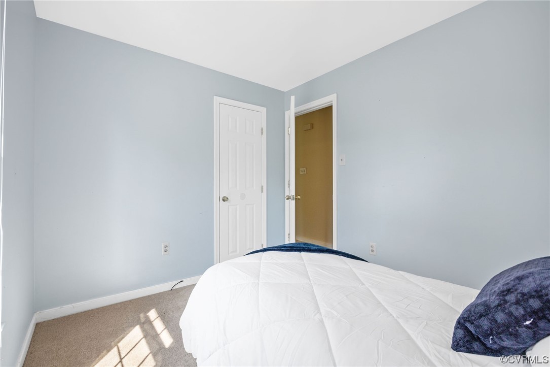 4841 Wilconna Road Chesterfield, VA 23832 - Photo 23 of 34 a bedroom with a bed and a window