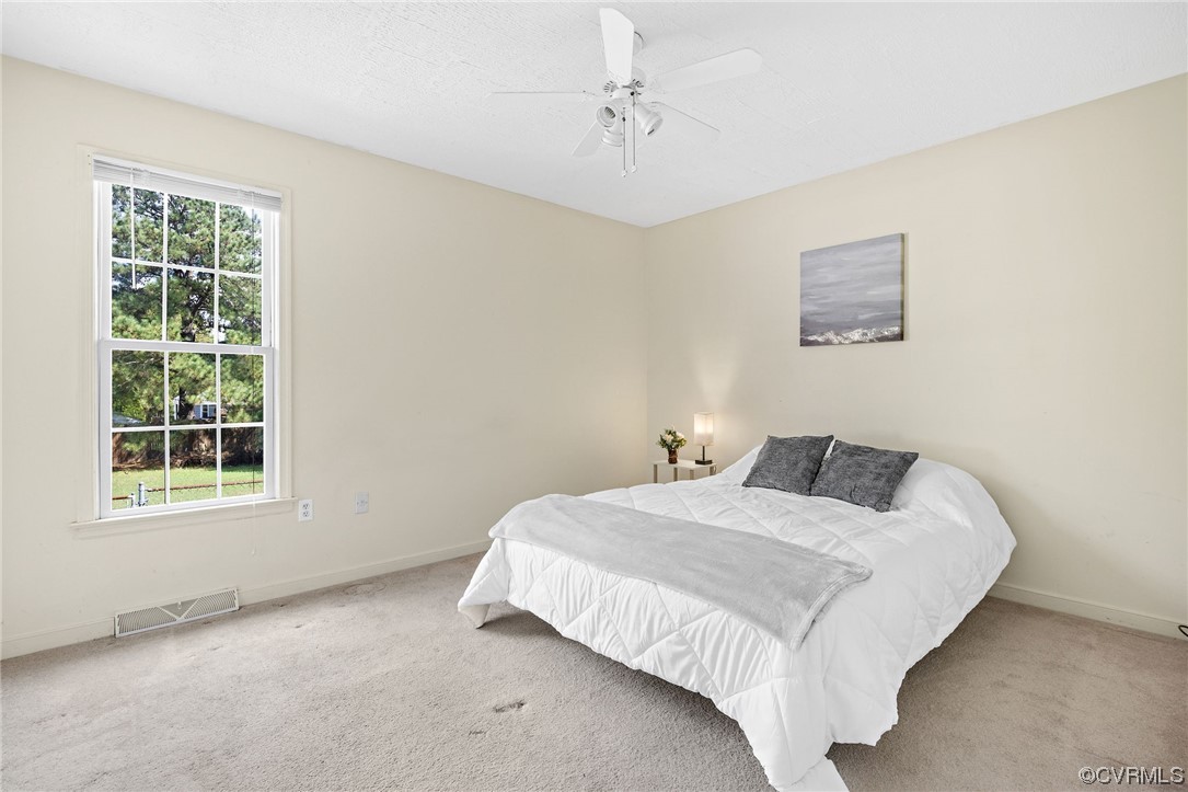 4841 Wilconna Road Chesterfield, VA 23832 - Photo 5 of 34 a bedroom with a bed and a window