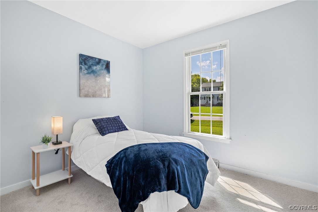 4841 Wilconna Road Chesterfield, VA 23832 - Photo 7 of 34 a bedroom with a bed and a window