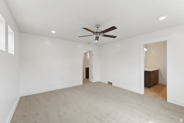 1617 North Angel Street Layton, UT 84041 - Photo 28 of 43 Unfurnished bedroom featuring light carpet, recessed lighting, ceiling fan, and connected bathroom