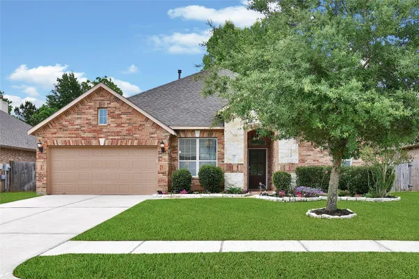 $485,000 | 911 River Crossing Drive, Conroe, TX 77384
