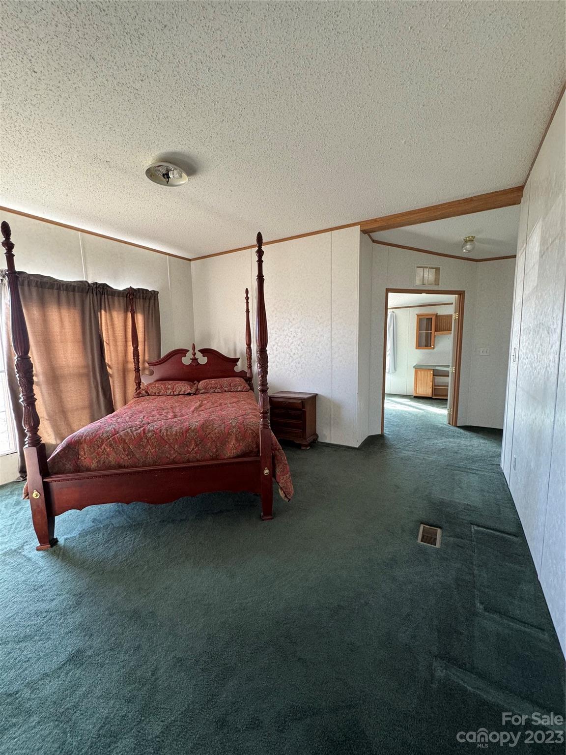 648 Ike Lynch Road Dallas, NC 28034 - Photo 15 of 32 a bedroom with a bed and a window