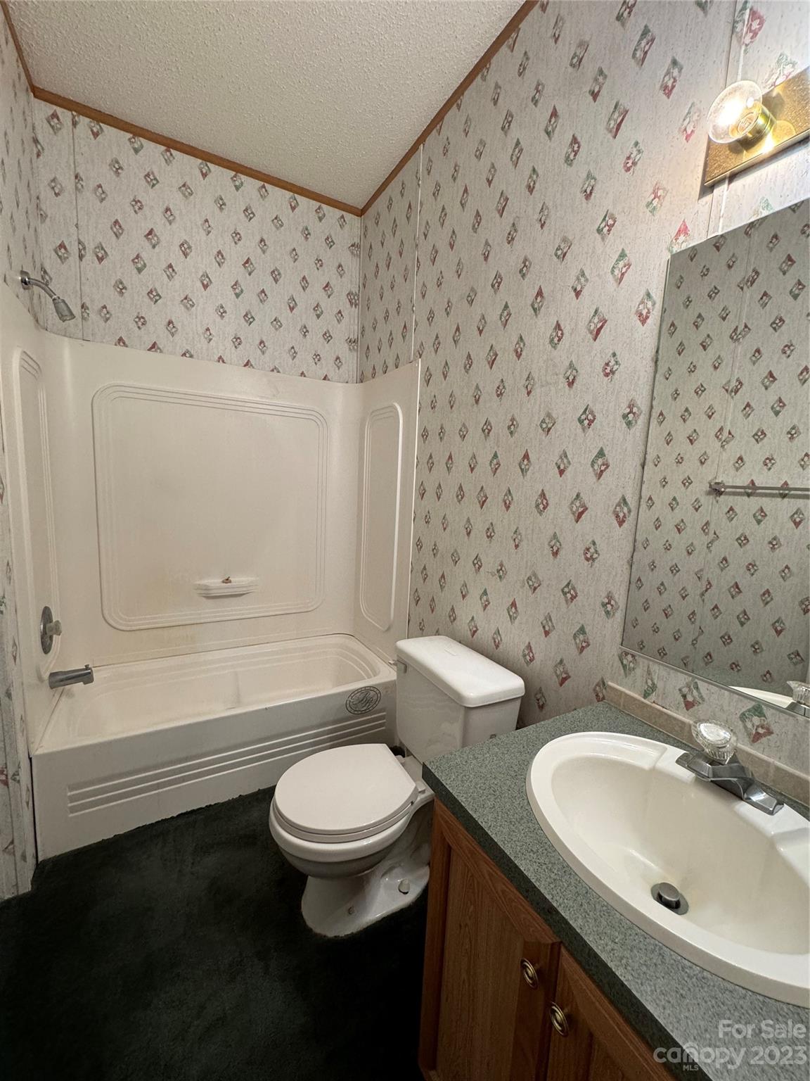 648 Ike Lynch Road Dallas, NC 28034 - Photo 25 of 32 a bathroom with a sink toilet and shower