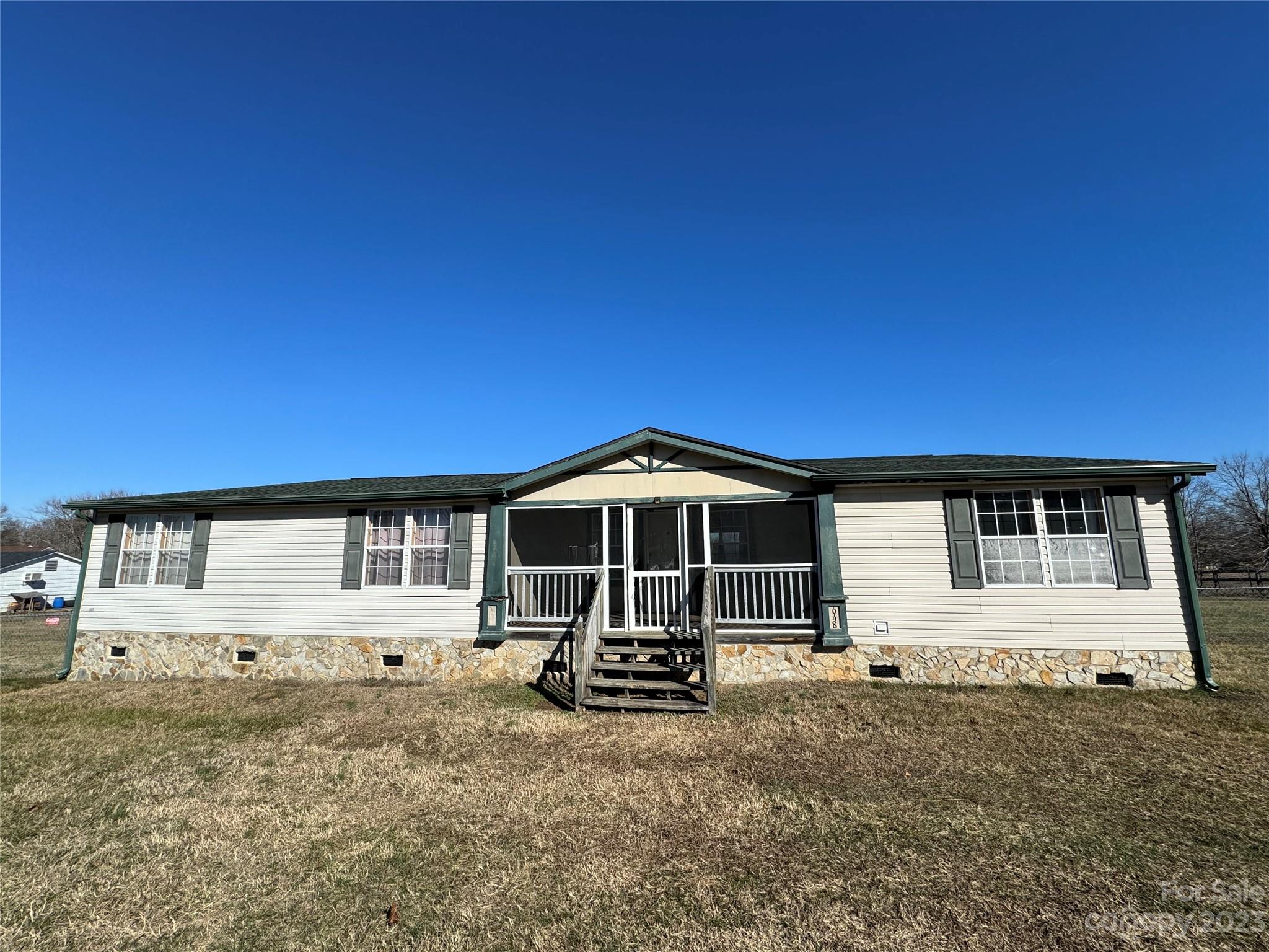 648 Ike Lynch Road Dallas, NC 28034 - Photo 29 of 32 a front view of a house with a yard
