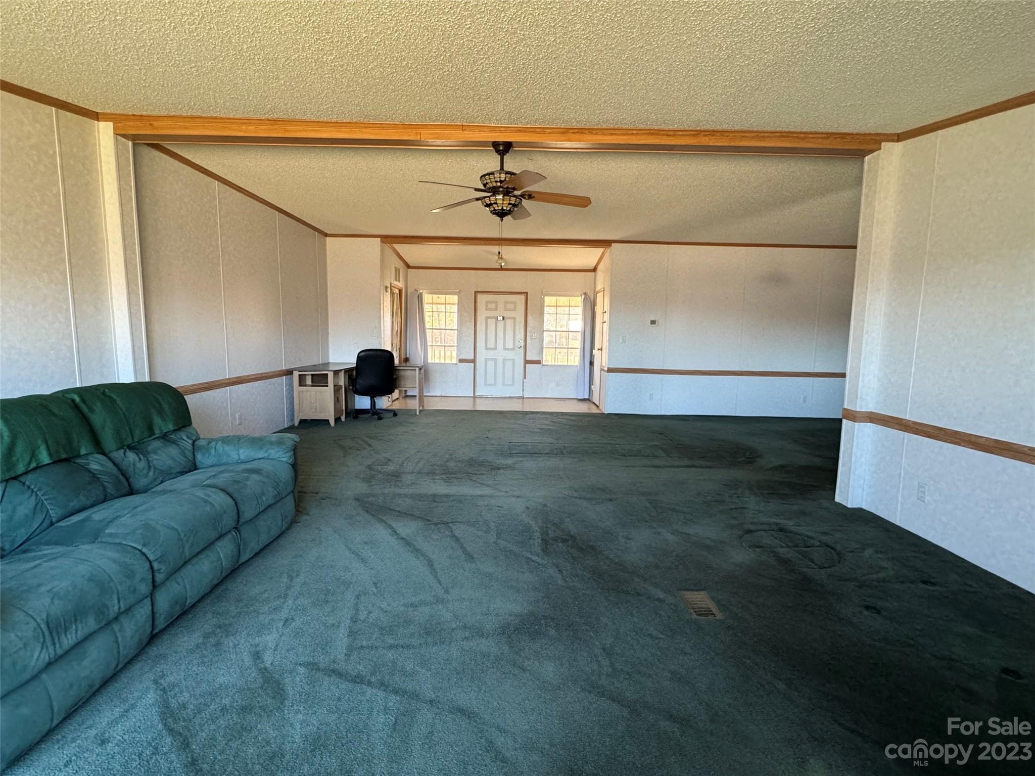 648 Ike Lynch Road Dallas, NC 28034 - Photo 3 of 32 a living room with furniture and a window