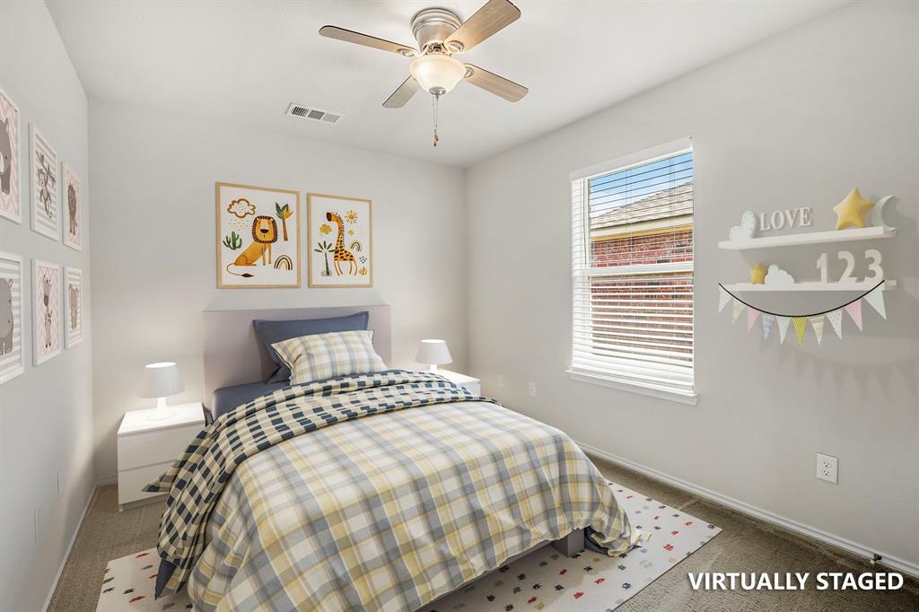 10620 Granada Drive Waco, TX 76708 - Photo 27 of 38 Ceiling fan with integrated lighting, single window with blinds, and light-colored walls