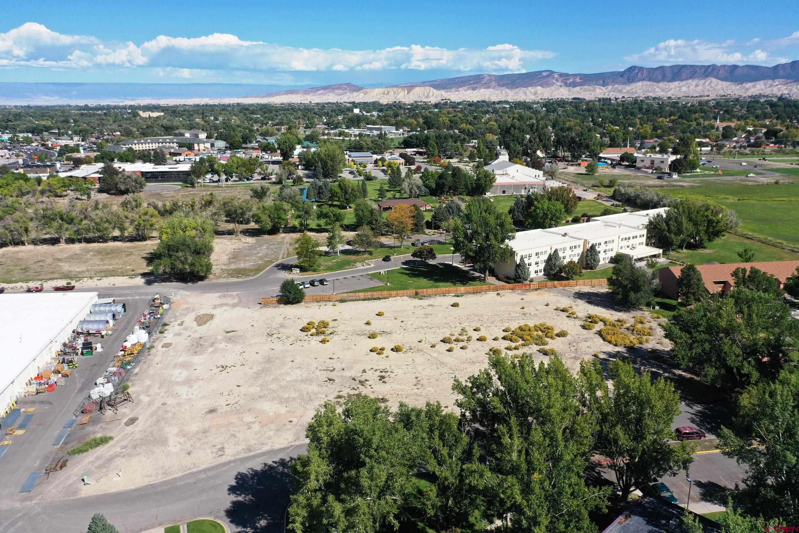 1600 Encanto Place Montrose, CO 81401 - Photo 1 of 19 a view of city and mountain
