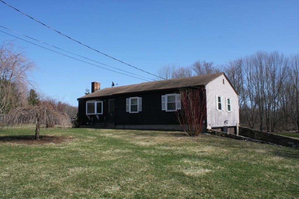 a house view with a garden