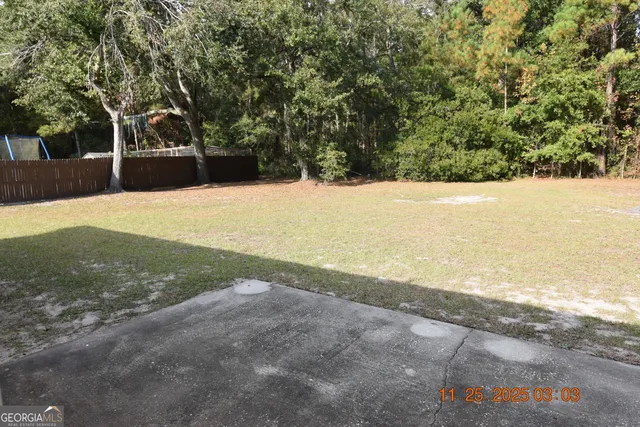 a view of outdoor space and yard