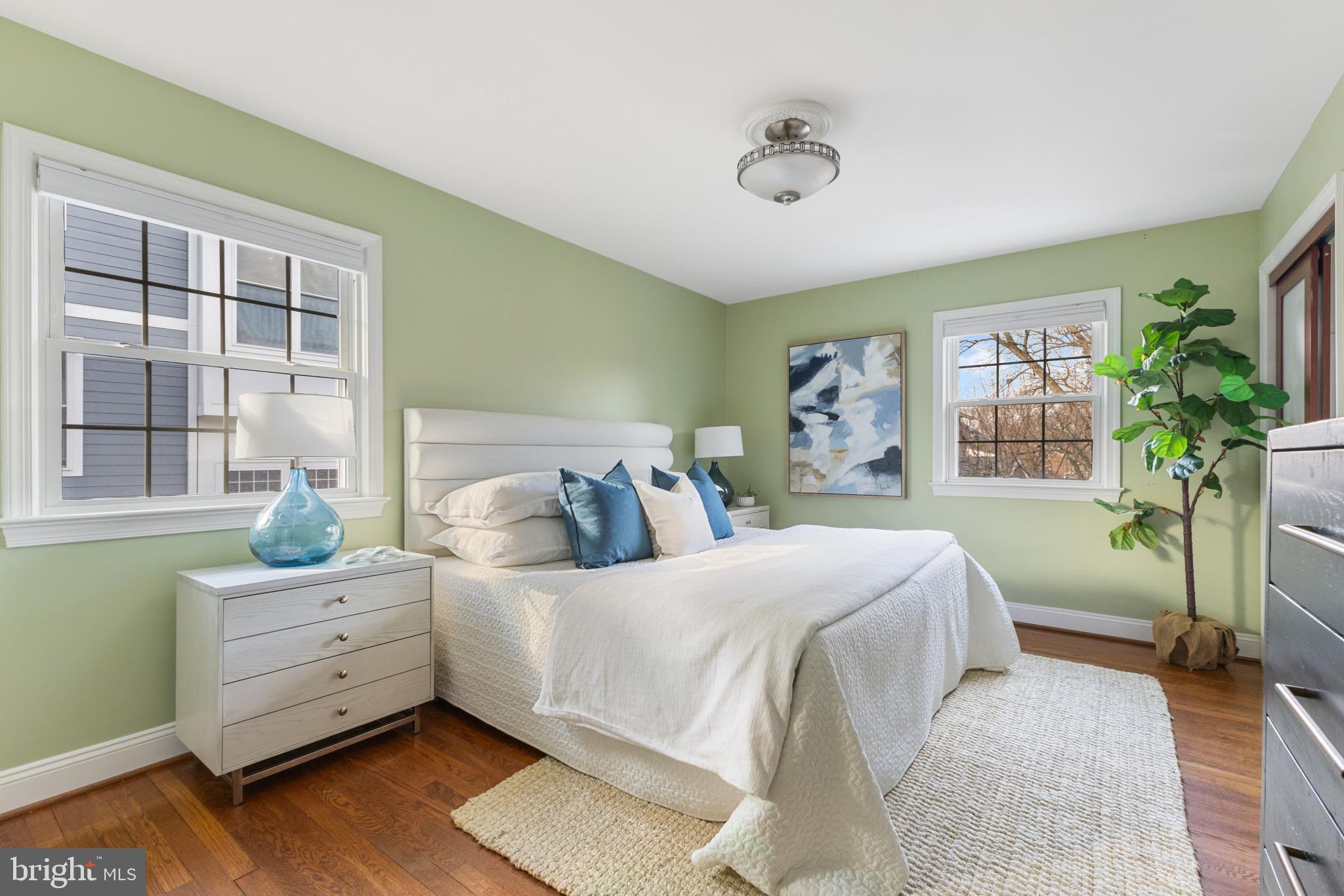 5400 27th Road North Arlington, VA 22207 - Photo 11 of 26 a bedroom with a large bed and a large window