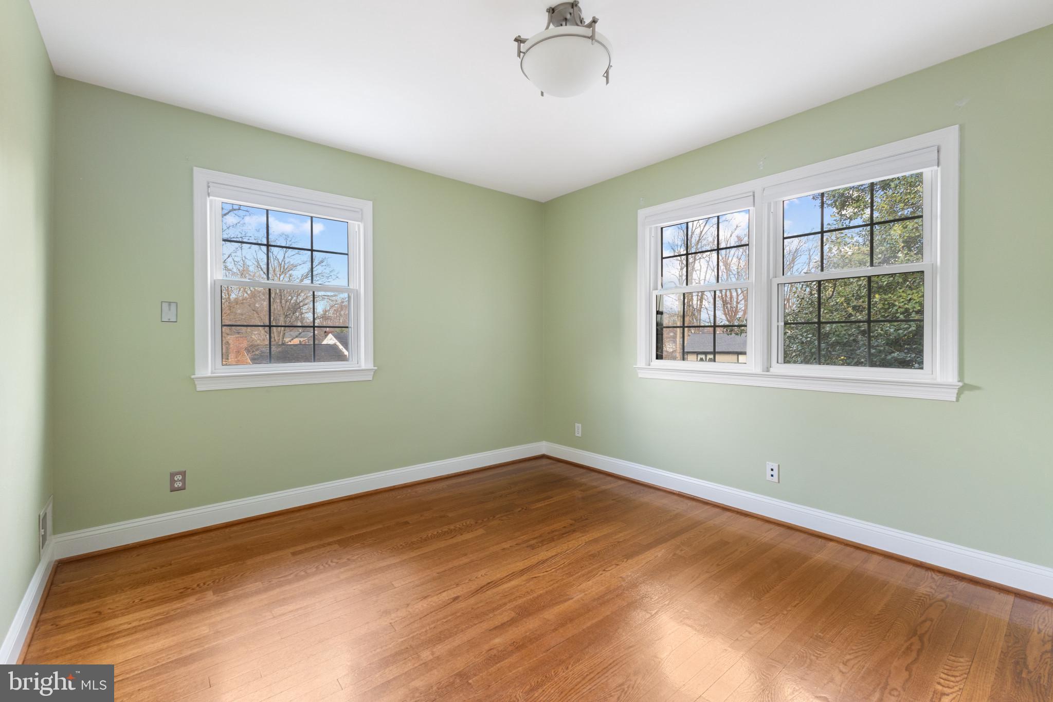 5400 27th Road North Arlington, VA 22207 - Photo 15 of 26 a view of a room with wooden floor and windows