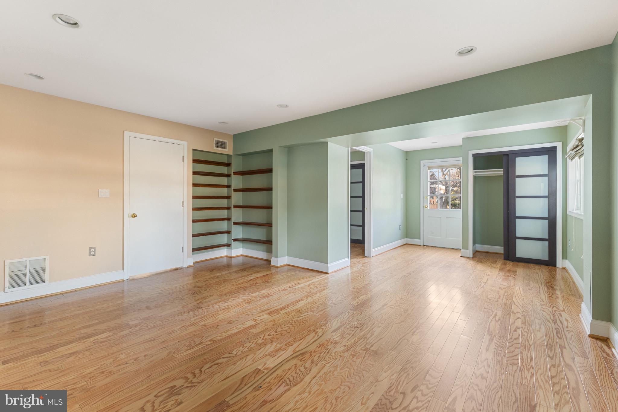 5400 27th Road North Arlington, VA 22207 - Photo 19 of 26 an empty room with wooden floor and closet