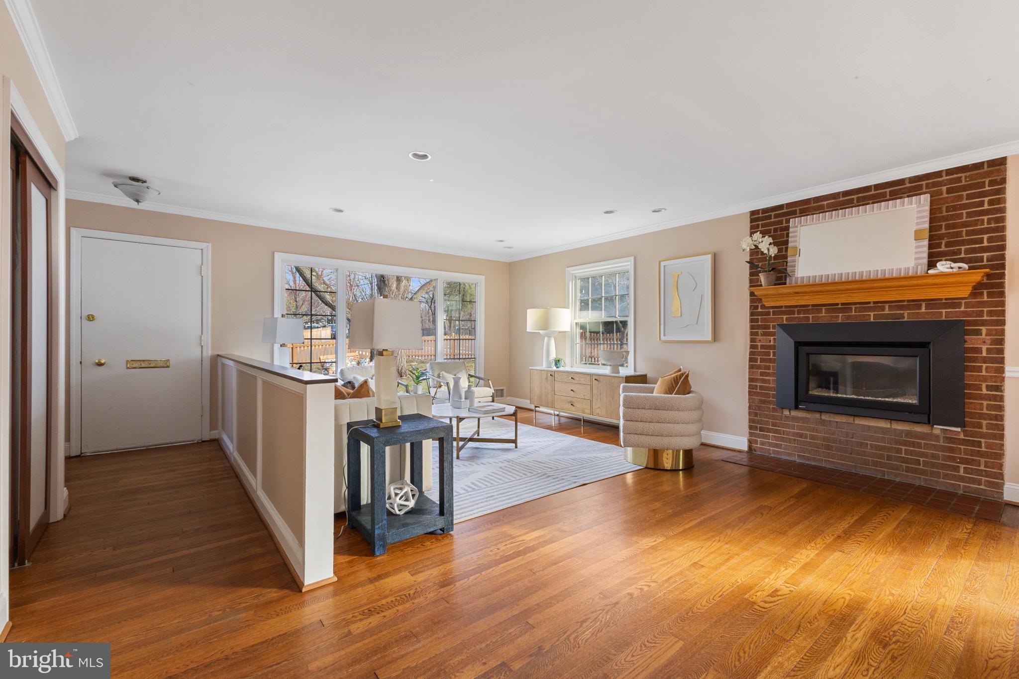 5400 27th Road North Arlington, VA 22207 - Photo 4 of 26 a living room with furniture and a fireplace