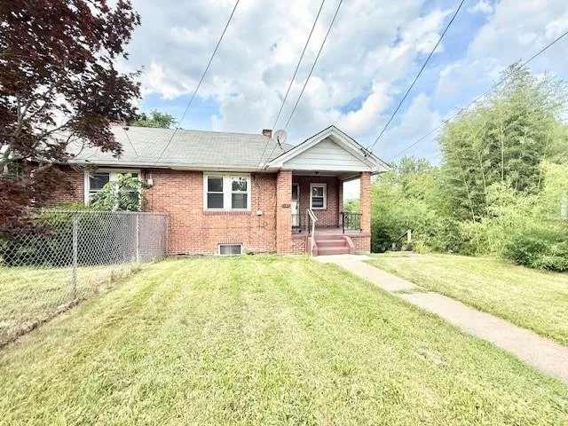 a front view of a house with a porch