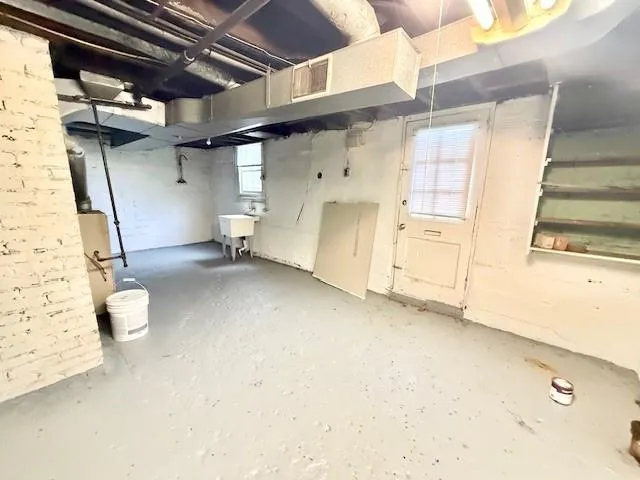 a view of a room with wooden walls